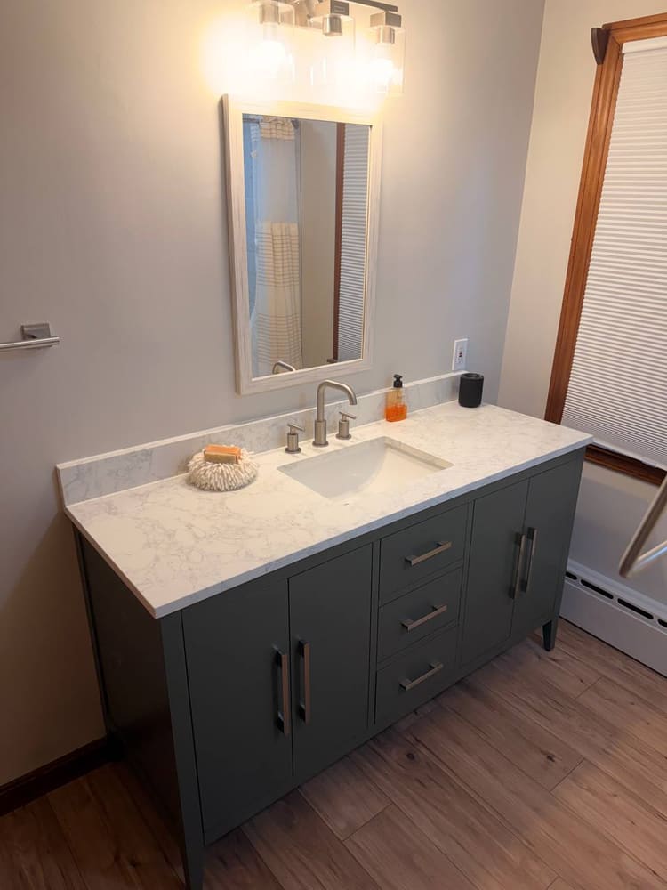 Recently completed tiled shower and bath